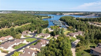 Experience the best of Porto Cima living in a villa that blends on The Club At Porto Cima in Missouri - for sale on GolfHomes.com, golf home, golf lot