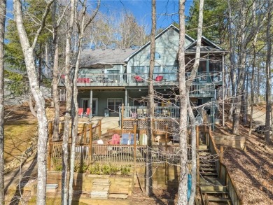 Welcome to your own slice of paradise! This charming waterfront on The Highlands Course at Lake Arrowhead in Georgia - for sale on GolfHomes.com, golf home, golf lot