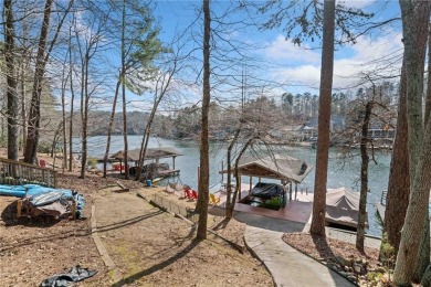 Welcome to your own slice of paradise! This charming waterfront on The Highlands Course at Lake Arrowhead in Georgia - for sale on GolfHomes.com, golf home, golf lot