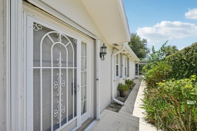 Don't miss this exceptional Divosta-built villa in highly on The Golf Club of Jupiter in Florida - for sale on GolfHomes.com, golf home, golf lot