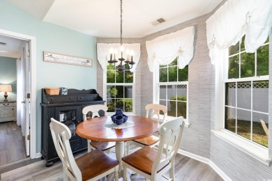 This beautifully maintained 3-bedroom, 2-bath home features a on Heron Point Golf Club in South Carolina - for sale on GolfHomes.com, golf home, golf lot