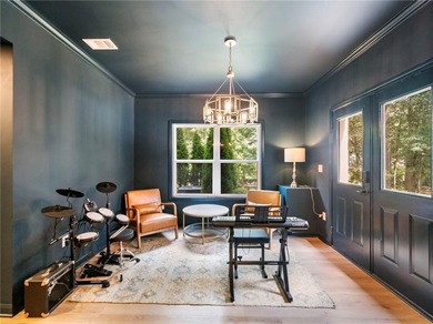 Experience refined resort living in this custom-built on Chateau Elan Golf Club  in Georgia - for sale on GolfHomes.com, golf home, golf lot