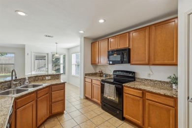 Welcome to 15944 Avenel Way, a charming single-story residence on The Golf Club At Champions Circle in Texas - for sale on GolfHomes.com, golf home, golf lot