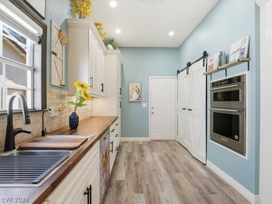 Welcome to this beautifully upgraded 2-bedroom townhome in the on Los Prados Golf Course in Nevada - for sale on GolfHomes.com, golf home, golf lot