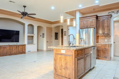 Custom golf course pool home in Schechert Estates on a quiet on Foothills Executive Golf Course in Arizona - for sale on GolfHomes.com, golf home, golf lot