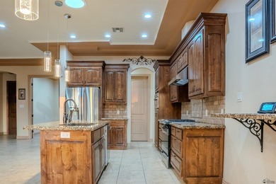 Custom golf course pool home in Schechert Estates on a quiet on Foothills Executive Golf Course in Arizona - for sale on GolfHomes.com, golf home, golf lot