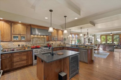 Experience North Idaho luxury living in this fully furnished on Avondale Golf and Tennis Club in Idaho - for sale on GolfHomes.com, golf home, golf lot