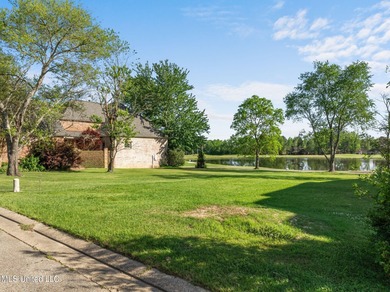 This golf course frontage lot in Canebrake is surrounded by on Canebrake Country Club in Mississippi - for sale on GolfHomes.com, golf home, golf lot