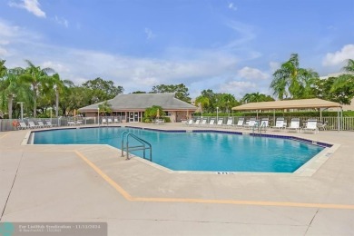 Bright and open Sunrise Lakes IV 2 Bedroom / 2 Bath first floor on Sunrise Lakes Phase IV Golf Course in Florida - for sale on GolfHomes.com, golf home, golf lot