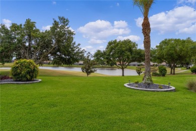 Experience stunning GOLF COURSE and WATER VIEWS without the on Amberwood Executive Golf Course in Florida - for sale on GolfHomes.com, golf home, golf lot