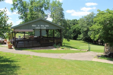 Motivated Seller! Wonderful 4 bedroom, 2 1/2 bath cabin in on Hide-A-Way Hills Club in Ohio - for sale on GolfHomes.com, golf home, golf lot