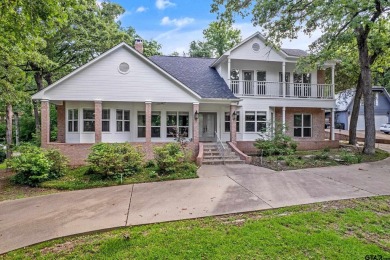 Experience resort-style living in this beautiful 4-bedroom on Hide-A-Way Lake Golf Course in Texas - for sale on GolfHomes.com, golf home, golf lot