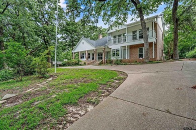 Experience resort-style living in this beautiful 4-bedroom on Hide-A-Way Lake Golf Course in Texas - for sale on GolfHomes.com, golf home, golf lot