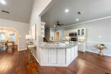 Experience resort-style living in this beautiful 4-bedroom on Hide-A-Way Lake Golf Course in Texas - for sale on GolfHomes.com, golf home, golf lot