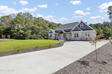 Prepare to be captivated by this stunning new construction on Belvedere Country Club in North Carolina - for sale on GolfHomes.com, golf home, golf lot