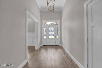 Prepare to be captivated by this stunning new construction on Belvedere Country Club in North Carolina - for sale on GolfHomes.com, golf home, golf lot