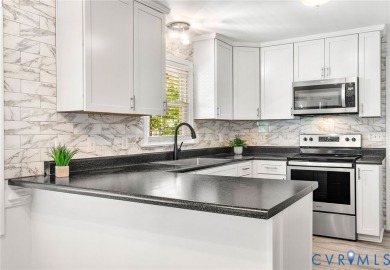 This beautiful recently updated 4 bedroom, 2 1/2 bath home, sits on Brandermill Country Club in Virginia - for sale on GolfHomes.com, golf home, golf lot