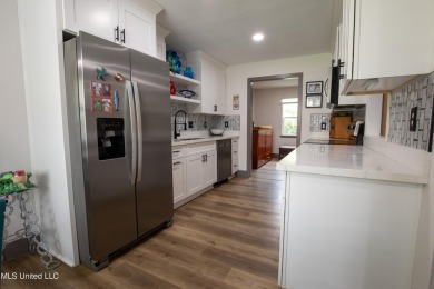 Welcome to this beautifully updated 3-bedroom, 2-bathroom home on Gulf Hills Golf Club in Mississippi - for sale on GolfHomes.com, golf home, golf lot
