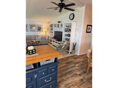 This beautifully maintained 3-bedroom, 2-bath Palm Harbor home on The Meadows At Countrywood in Florida - for sale on GolfHomes.com, golf home, golf lot
