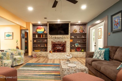 Welcome to this beautifully updated 3-bedroom, 2-bathroom home on Gulf Hills Golf Club in Mississippi - for sale on GolfHomes.com, golf home, golf lot