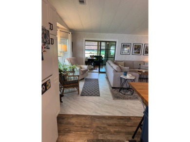 This beautifully maintained 3-bedroom, 2-bath Palm Harbor home on The Meadows At Countrywood in Florida - for sale on GolfHomes.com, golf home, golf lot