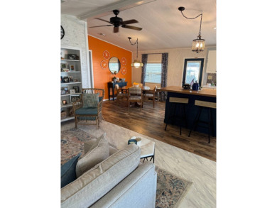 This beautifully maintained 3-bedroom, 2-bath Palm Harbor home on The Meadows At Countrywood in Florida - for sale on GolfHomes.com, golf home, golf lot