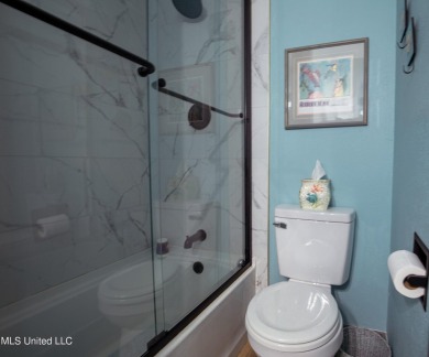 Welcome to this beautifully updated 3-bedroom, 2-bathroom home on Gulf Hills Golf Club in Mississippi - for sale on GolfHomes.com, golf home, golf lot