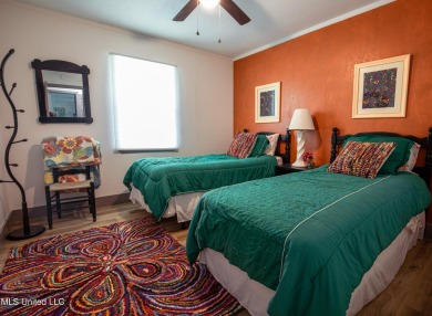 Welcome to this beautifully updated 3-bedroom, 2-bathroom home on Gulf Hills Golf Club in Mississippi - for sale on GolfHomes.com, golf home, golf lot