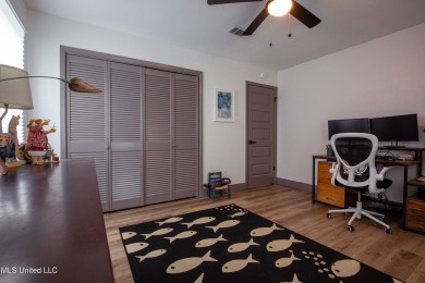 Welcome to this beautifully updated 3-bedroom, 2-bathroom home on Gulf Hills Golf Club in Mississippi - for sale on GolfHomes.com, golf home, golf lot
