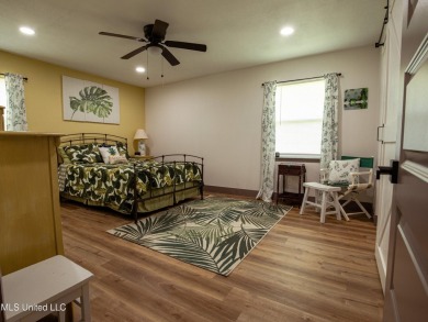 Welcome to this beautifully updated 3-bedroom, 2-bathroom home on Gulf Hills Golf Club in Mississippi - for sale on GolfHomes.com, golf home, golf lot