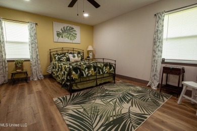 Welcome to this beautifully updated 3-bedroom, 2-bathroom home on Gulf Hills Golf Club in Mississippi - for sale on GolfHomes.com, golf home, golf lot