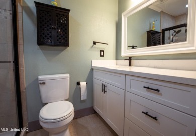 Welcome to this beautifully updated 3-bedroom, 2-bathroom home on Gulf Hills Golf Club in Mississippi - for sale on GolfHomes.com, golf home, golf lot