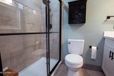 Welcome to this beautifully updated 3-bedroom, 2-bathroom home on Gulf Hills Golf Club in Mississippi - for sale on GolfHomes.com, golf home, golf lot