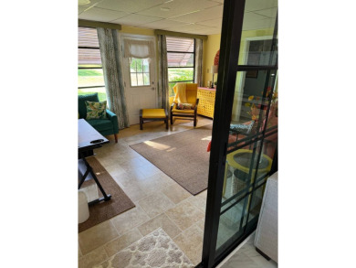 This beautifully maintained 3-bedroom, 2-bath Palm Harbor home on The Meadows At Countrywood in Florida - for sale on GolfHomes.com, golf home, golf lot