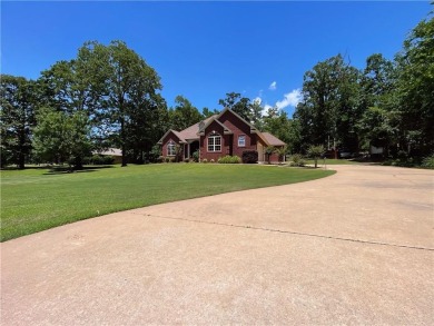 Live in comfort and style on the 16th tee at Lions Den Golf on Lions Den Golf Club in Arkansas - for sale on GolfHomes.com, golf home, golf lot
