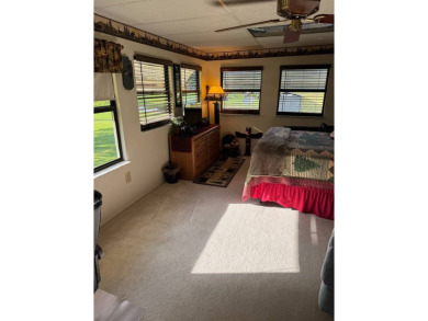 This beautifully maintained 3-bedroom, 2-bath Palm Harbor home on The Meadows At Countrywood in Florida - for sale on GolfHomes.com, golf home, golf lot