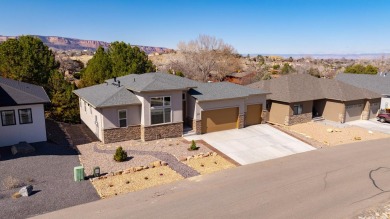 You need to see this exceptional Redlands home in Pinnacle Ridge on The Golf Club At Redlands Mesa in Colorado - for sale on GolfHomes.com, golf home, golf lot