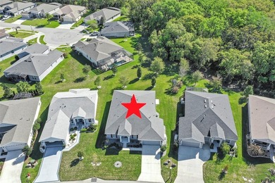 Welcome to a life that feels like vacation every day. Nestled in on Arlington Ridge Golf Club in Florida - for sale on GolfHomes.com, golf home, golf lot