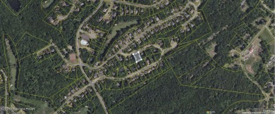 Upscale vacant lot in a community that offers a pool, playground on Country Club of the Poconos Golf Course in Pennsylvania - for sale on GolfHomes.com, golf home, golf lot