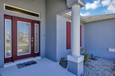 Welcome to a life that feels like vacation every day. Nestled in on Arlington Ridge Golf Club in Florida - for sale on GolfHomes.com, golf home, golf lot