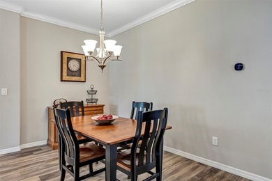 Welcome to a life that feels like vacation every day. Nestled in on Arlington Ridge Golf Club in Florida - for sale on GolfHomes.com, golf home, golf lot