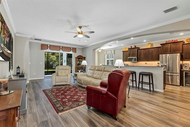 Welcome to a life that feels like vacation every day. Nestled in on Arlington Ridge Golf Club in Florida - for sale on GolfHomes.com, golf home, golf lot