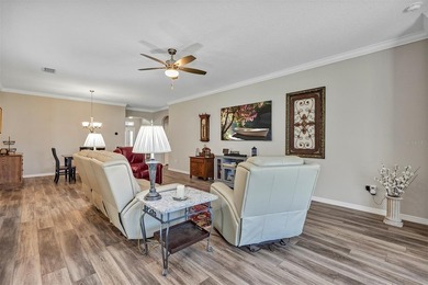 Welcome to a life that feels like vacation every day. Nestled in on Arlington Ridge Golf Club in Florida - for sale on GolfHomes.com, golf home, golf lot