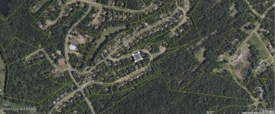 Upscale vacant lot in a community that offers a pool, playground on Country Club of the Poconos Golf Course in Pennsylvania - for sale on GolfHomes.com, golf home, golf lot