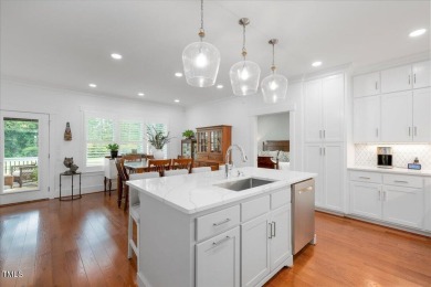 This stunning custom-built residence combines modern design on Henderson Country Club in North Carolina - for sale on GolfHomes.com, golf home, golf lot