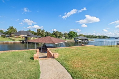 Waterfront home with approximately 150 feet of shoreline on Pinnacle Golf and Boat Club in Texas - for sale on GolfHomes.com, golf home, golf lot