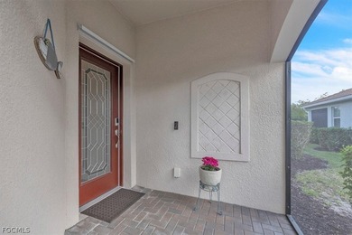 Welcome to this charming villa, formerly a model home, that is on Pelican Preserve Golf Club in Florida - for sale on GolfHomes.com, golf home, golf lot