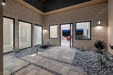 This stunning single-story smart home blends luxury with on Reflection Bay Golf Club in Nevada - for sale on GolfHomes.com, golf home, golf lot