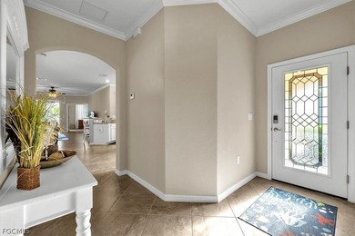 Welcome to this charming villa, formerly a model home, that is on Pelican Preserve Golf Club in Florida - for sale on GolfHomes.com, golf home, golf lot