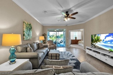 Welcome to this charming villa, formerly a model home, that is on Pelican Preserve Golf Club in Florida - for sale on GolfHomes.com, golf home, golf lot